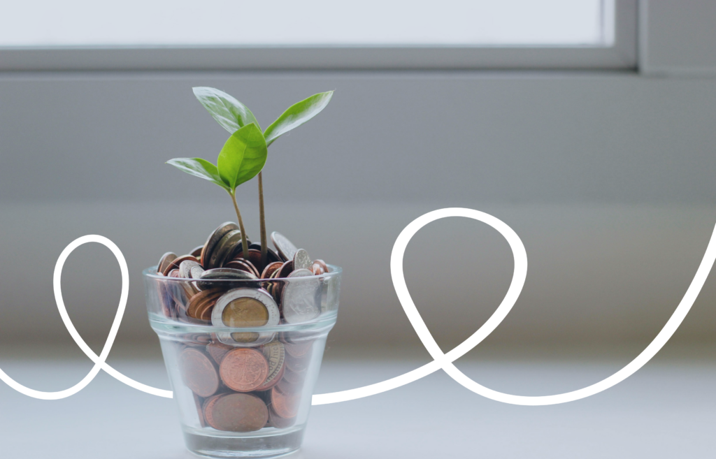 Plant sprouting from a glass filled with coins, symbolizing financial growth and long-term revenue generation.